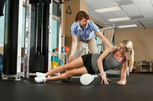 Woman Physical Therapist Instructor Helping Her Patient